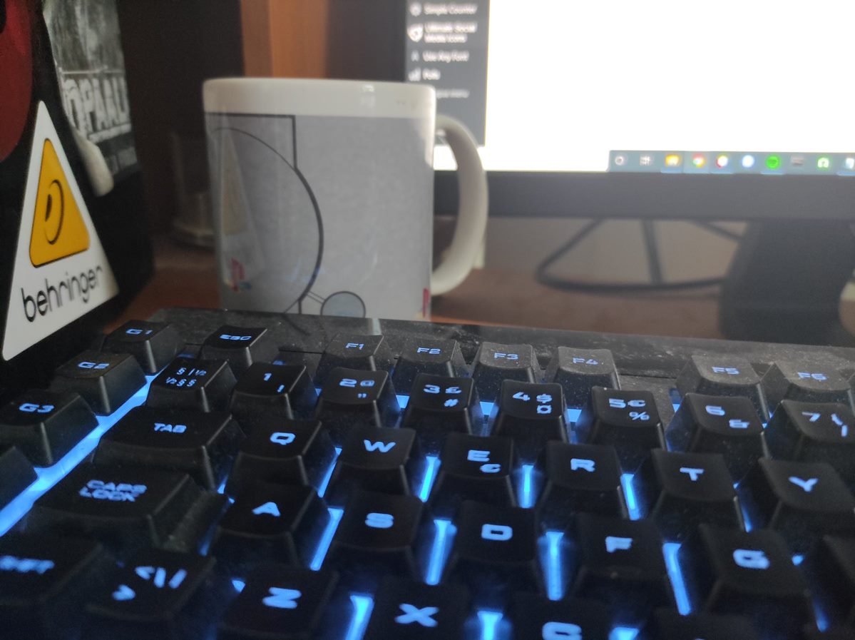 keyboard with a PS1 coffee mug