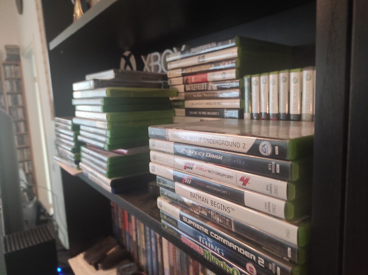 a shelf of video games