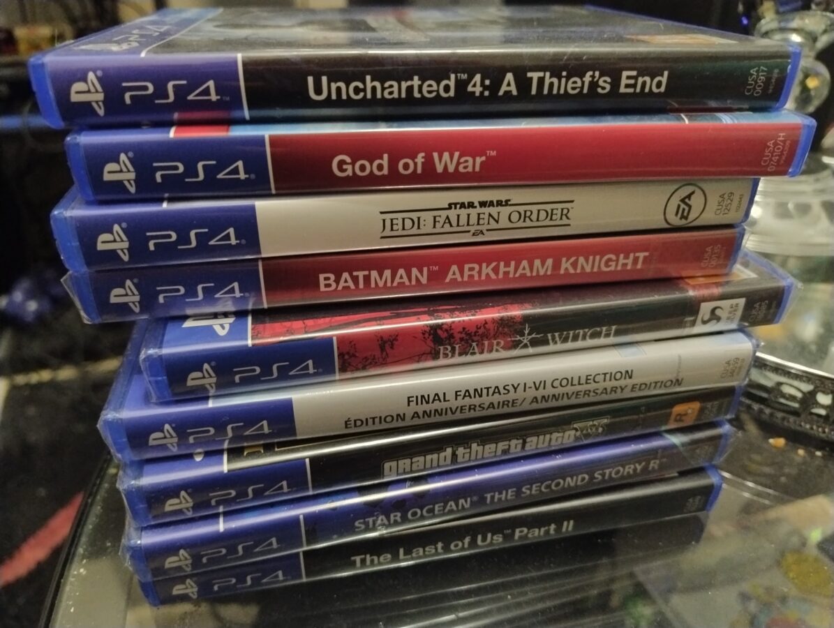 a pile of ps4 games