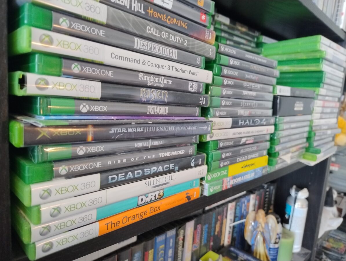 piles of games on a shelf